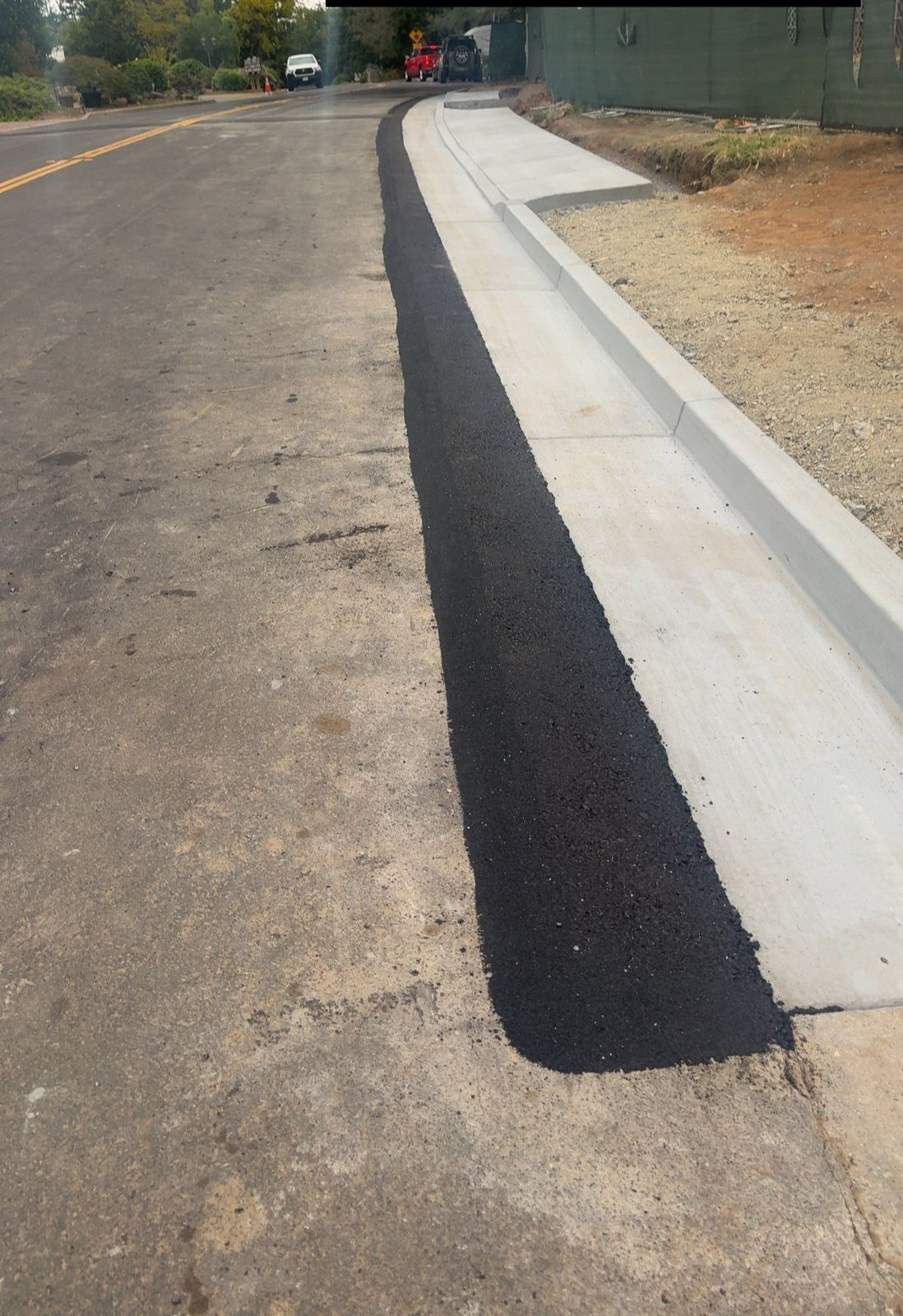 New curb and gutter with asphalt tie-in