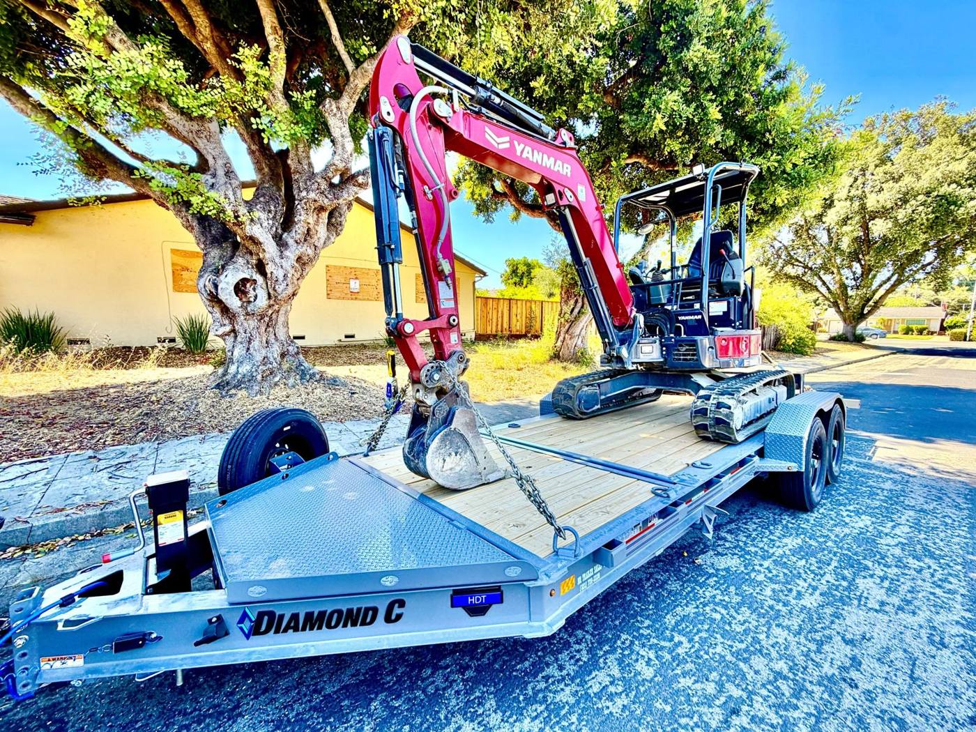 Yanmar mini excavator on a Diamond C equipment trailer